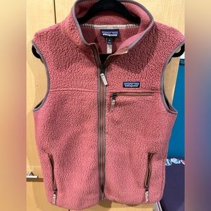 Pink Patagonia fleece vest.
